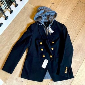 Double breasted blazer with hoodie dickie detail.